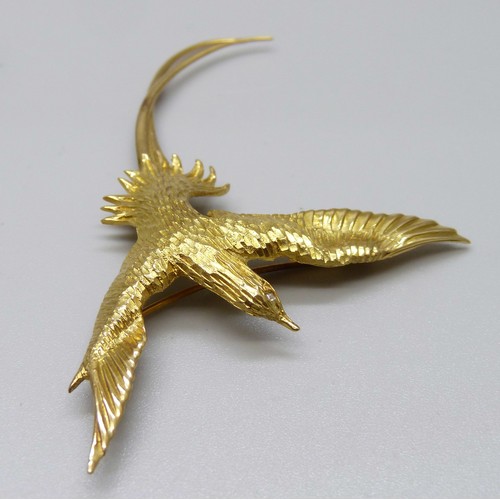 962 - A yellow metal and diamond bird of paradise brooch with diamond eye, 10.3g, 8cm