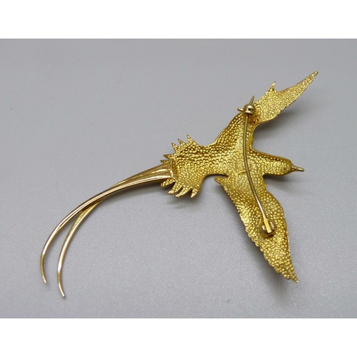 962 - A yellow metal and diamond bird of paradise brooch with diamond eye, 10.3g, 8cm