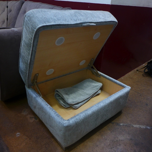 1365 - A silver upholstered ottoman footstool