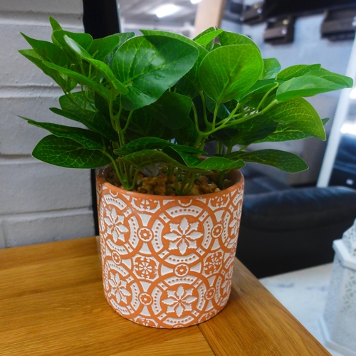 1420 - A faux green plant in a Moroccan tile pattern pot (63098104)