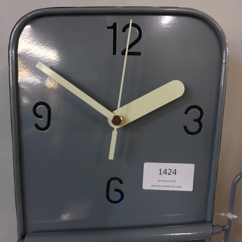 1424 - A grey metal sardine tin wall clock, H 30cms (HKL1110)   #