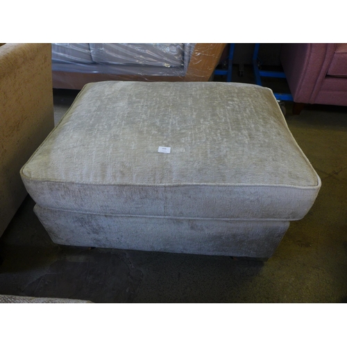 1605 - A silver upholstered large cushioned top rectangular footstool