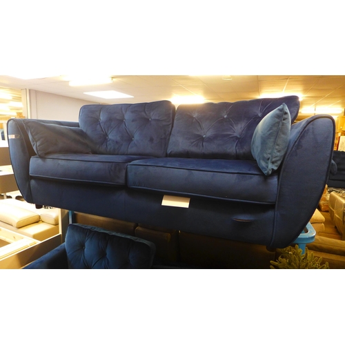 1655 - A deep ocean blue velvet three seater sofa - tear on front of sofa and a deep ocean blue velvet thre... 