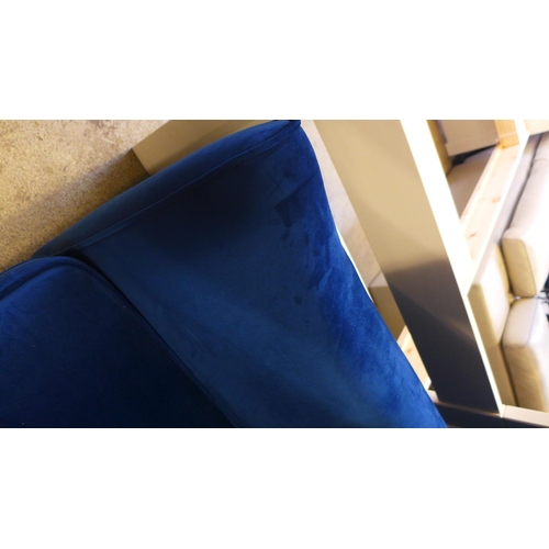 1655 - A deep ocean blue velvet three seater sofa - tear on front of sofa and a deep ocean blue velvet thre... 