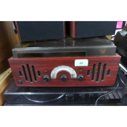 2328 - National Panasonic stereogram and Genexa rosewood effect radio-record player with speakers