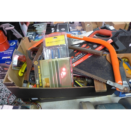 2050 - 2 Trays of assorted woodworking tools: saws, lights, planes, honing stones, many sealed/unused