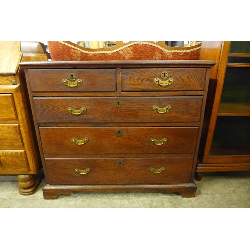 105 - A George III oak chest of drawers