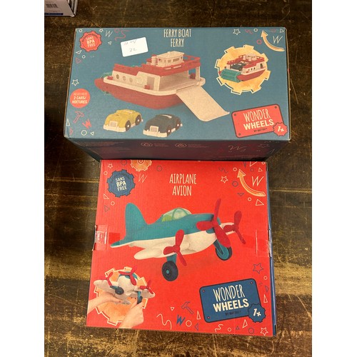 2062 - Child's wonder wheels ferryboat toy and 1 x airplane toy (Unused)