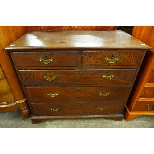 105 - A George III oak chest of drawers