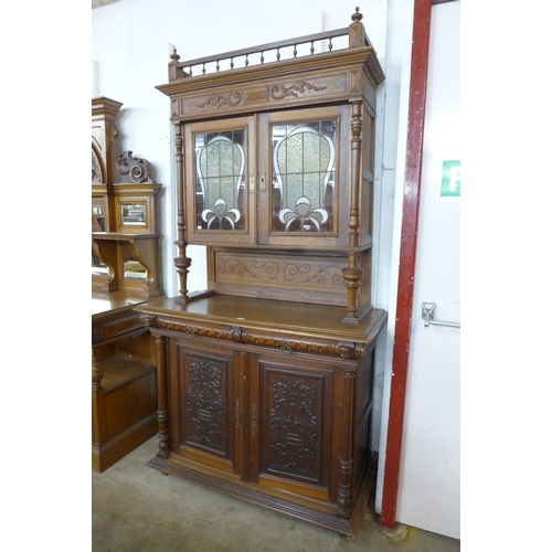 112 - A late 19th/early 20th Century French carved oak and walnut dresser