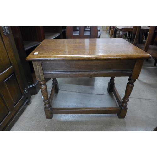 126 - A pair of Victorian elm and beech Windsor kitchen chairs, stamped O'Haines, High Wycombe and an oak ... 