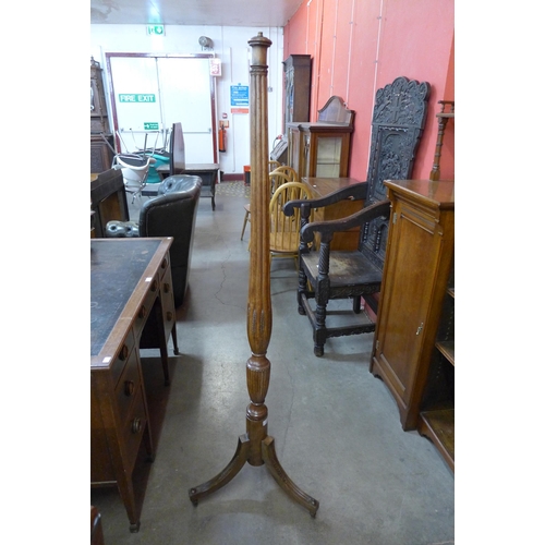 13 - A Hepplewhite style mahogany floor standing lamp