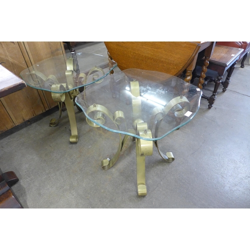 132 - A pair of Italian gilt metal and glass topped occasional tables