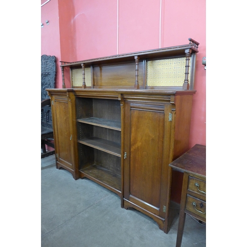 14 - A Victorian Aesthetic Movement walnut breakfront bookcase