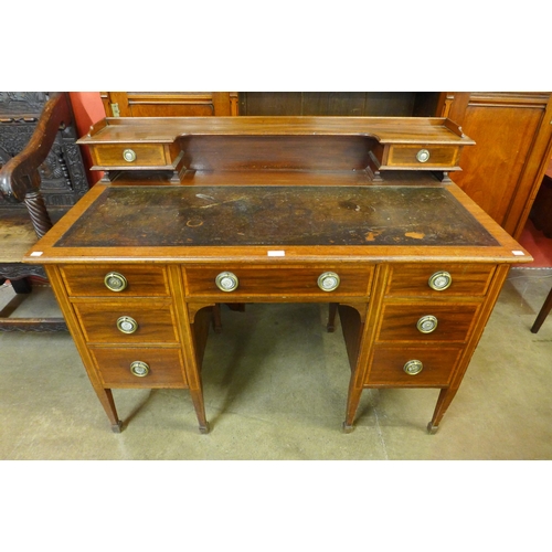 15 - A late Victorian Warings inlaid mahogany desk