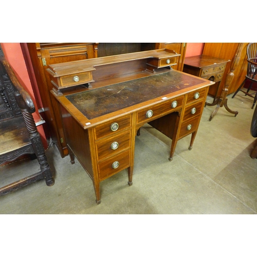 15 - A late Victorian Warings inlaid mahogany desk