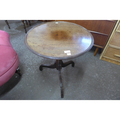 151 - A Victorian mahogany circular tripod wine table