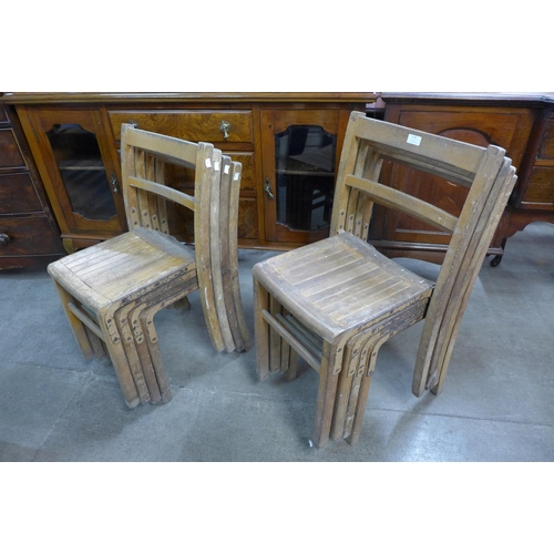 176 - A set of eight beech stacking chairs