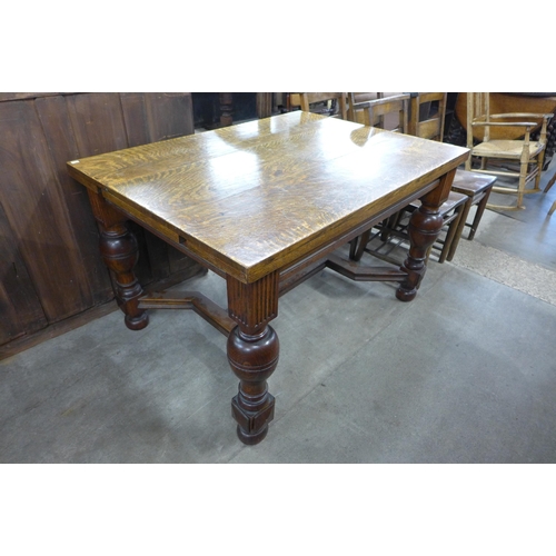 184 - A 17th Century style oak refectory table