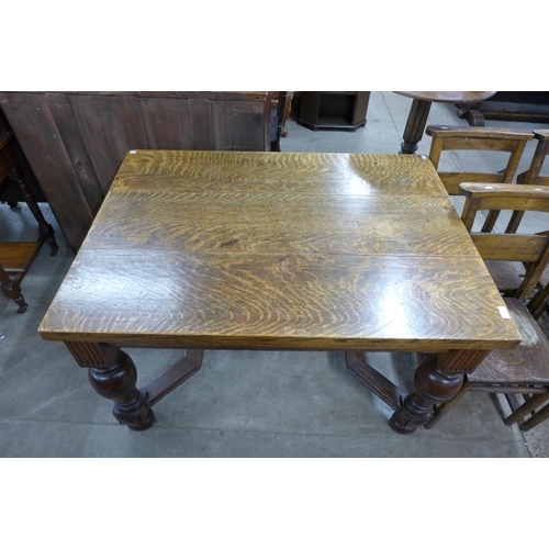 184 - A 17th Century style oak refectory table