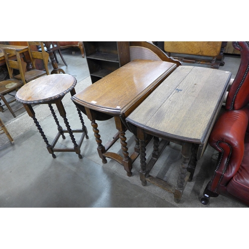 186 - Two oak barleytwist gateleg tables and an occasional table