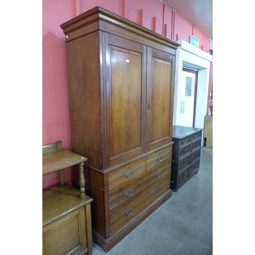 2 - A late Victorian walnut linen press