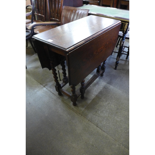 200 - An oak barleytwist gateleg table