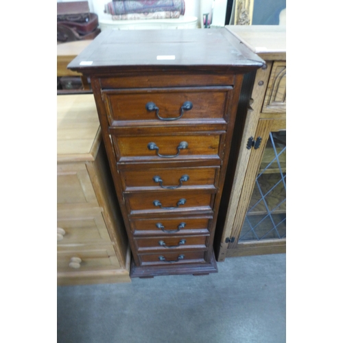 207 - A hardwood chest of drawers