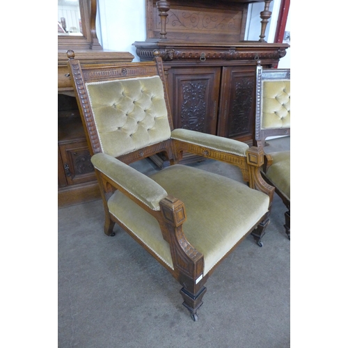 21 - A pair of Victorian Aesthetic Movement carved oak and green fabric upholstered lady's and gentleman'... 