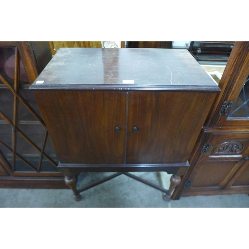 219 - An early 20th Century mahogany record cabinet