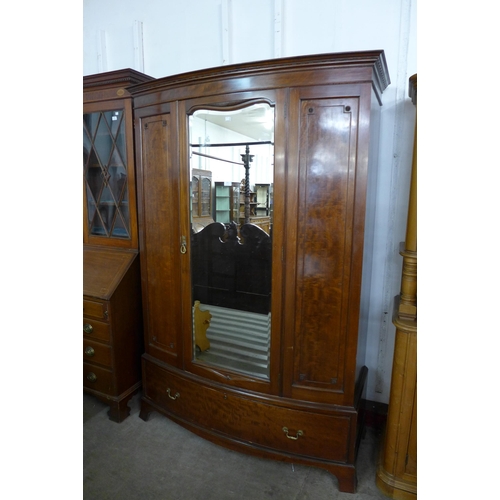 226 - An Edward VII mahogany bow front wardrobe