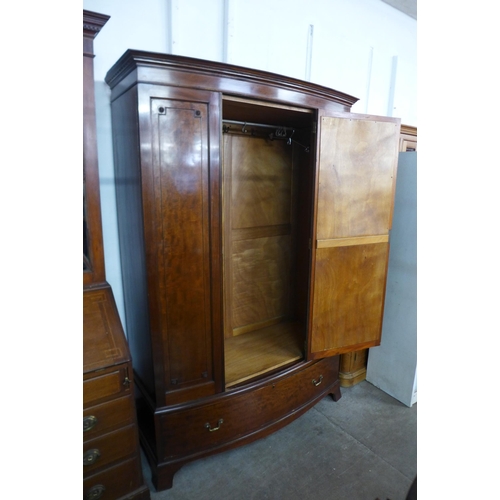 226 - An Edward VII mahogany bow front wardrobe