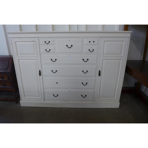 247 - A Victorian style painted pine low wardrobe