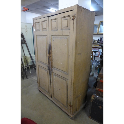 249 - A George III painted pine two door cupboard (signs of old woodworm, may require treating)