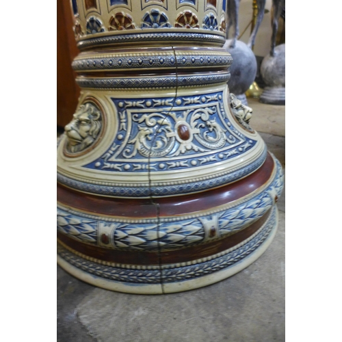 260 - An Aesthetic Movement stoneware jardiniere on stand