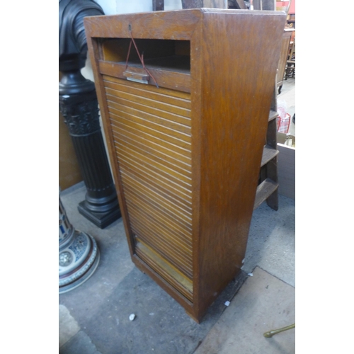 263 - An oak tambour front filing cabinet