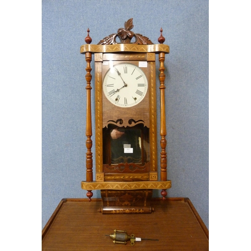 313 - A 19th Century American inlaid walnut wall clock