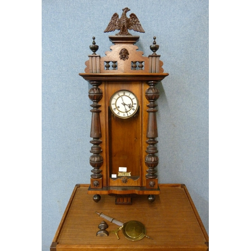 314 - A 19th Century walnut Vienna wall clock