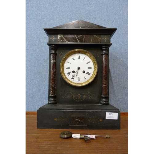 315 - A 19th Century French Belge noir mantel clock