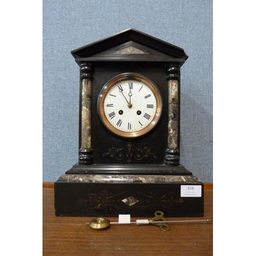 316 - A 19th Century French Belge noir mantel clock