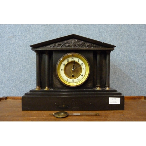 319 - A 19th Century French Belge noir mantel clock