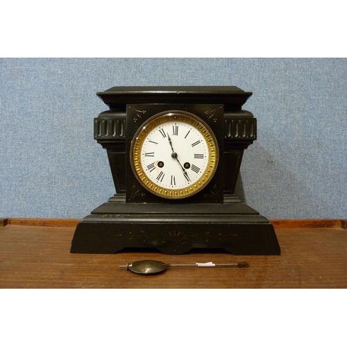 320 - A 19th Century French Belge noir mantel clock