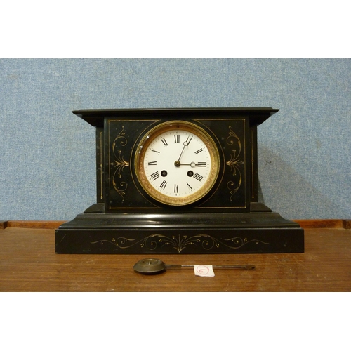 321 - A 19th Century French Belge noir mantel clock