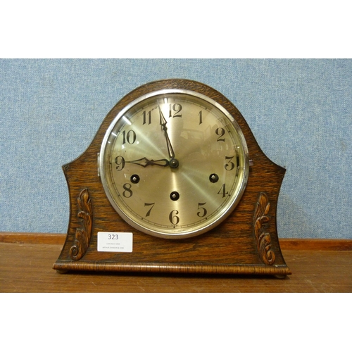 323 - An oak Westminster chime mantel clock