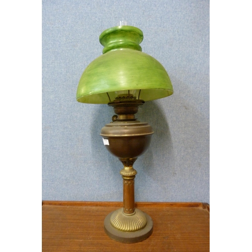 326 - A Victorian brass oil lamp