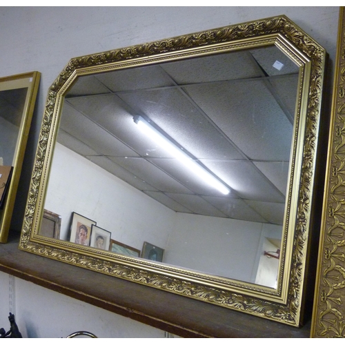 346A - A gilt framed overmantle mirror