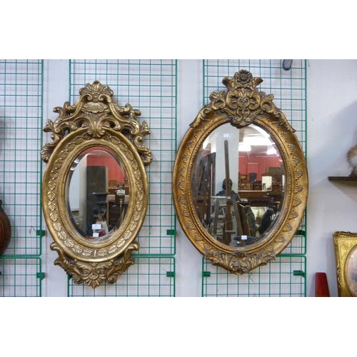 348 - Two similar French style gilt framed mirrors