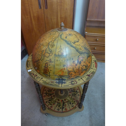 35 - A terrestrial globe cocktail cabinet/trolley