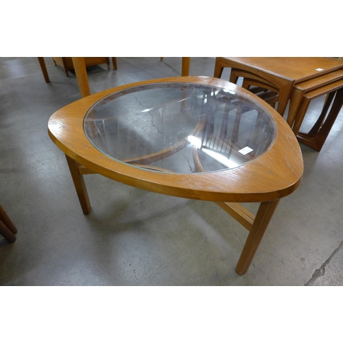 39 - A Nathan teak and glass topped coffee table