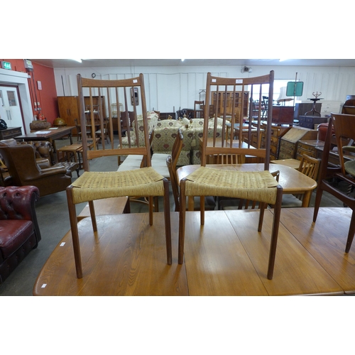 45 - A pair of Danish Mogens Kold teak and paper cord seated chairs, designed by Arne Hovmand Olsen